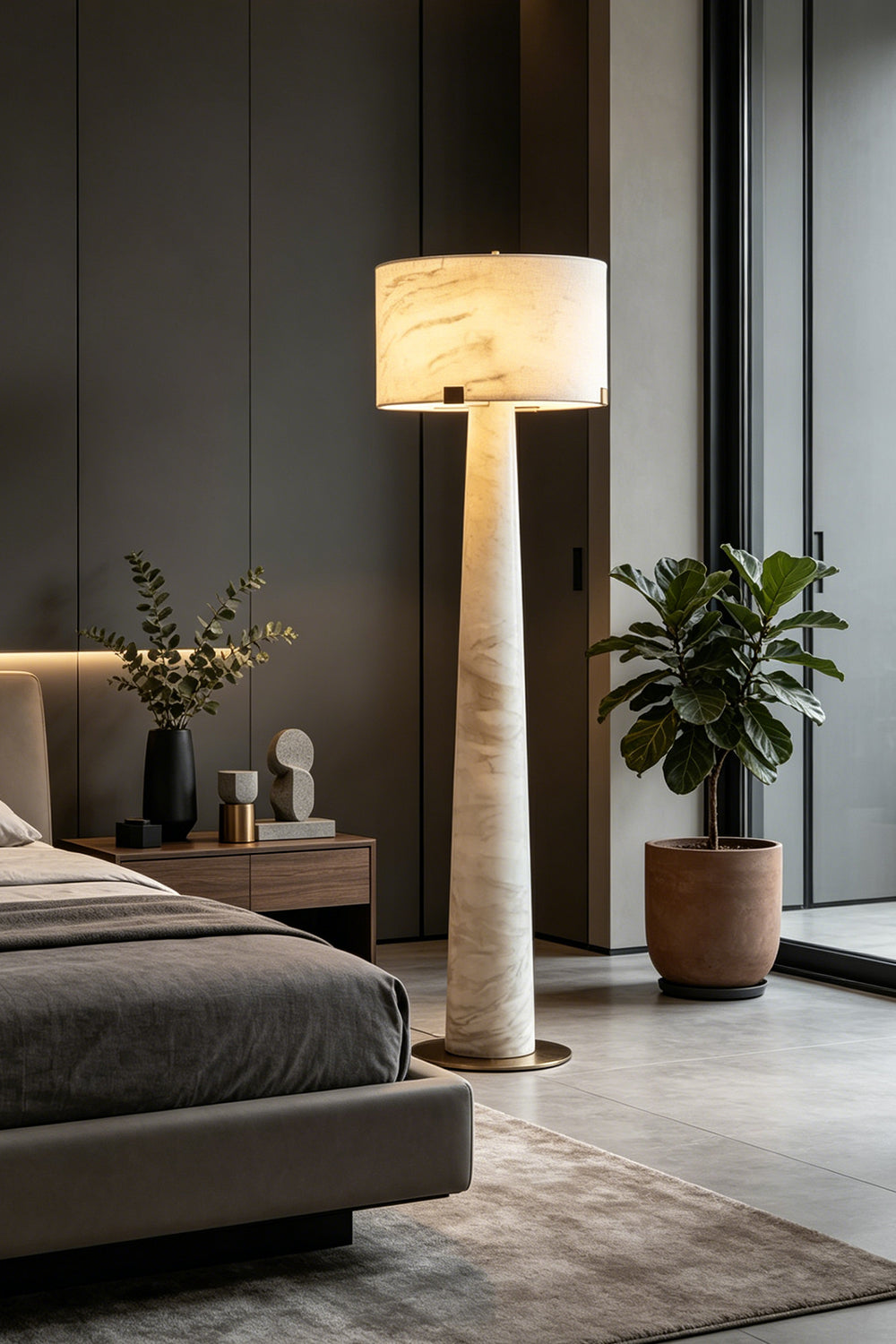 Meridian Column Alabaster Floor Lamp | Alabaster, Brass | Bedside installation in a master bedroom with grey tones | Samu Lamp