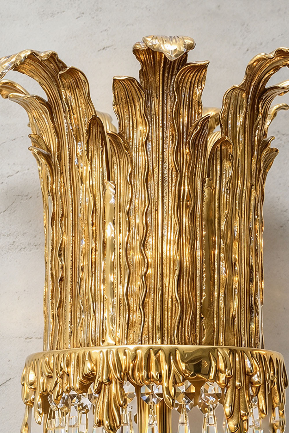 Mervaise Brass Cherub Crystal Tier Table Lamp | Brass and Crystal | Close-up detail of the top brass acanthus leaf crown ornamentation | Samu Lamp