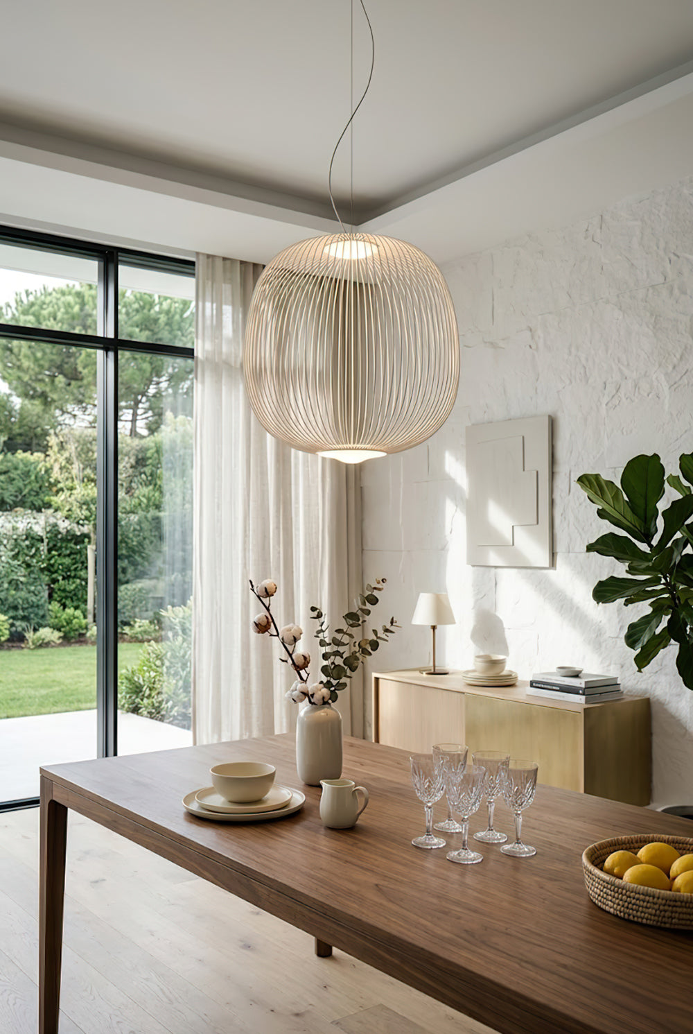White elliptical wire cage lamp near large window | Aluminum | Bright dining room interior with wooden furniture | Samu Lamp