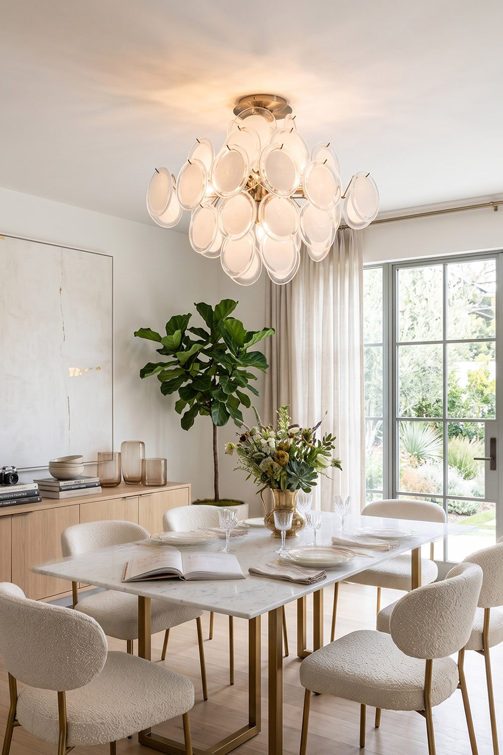 Mirella Circular Glass Pane Ceiling Light | Contemporary Dining Area | Staged overhead in a well-lit residential dining space pairing a light wood table with minimalist cream chairs | Samu Lamp