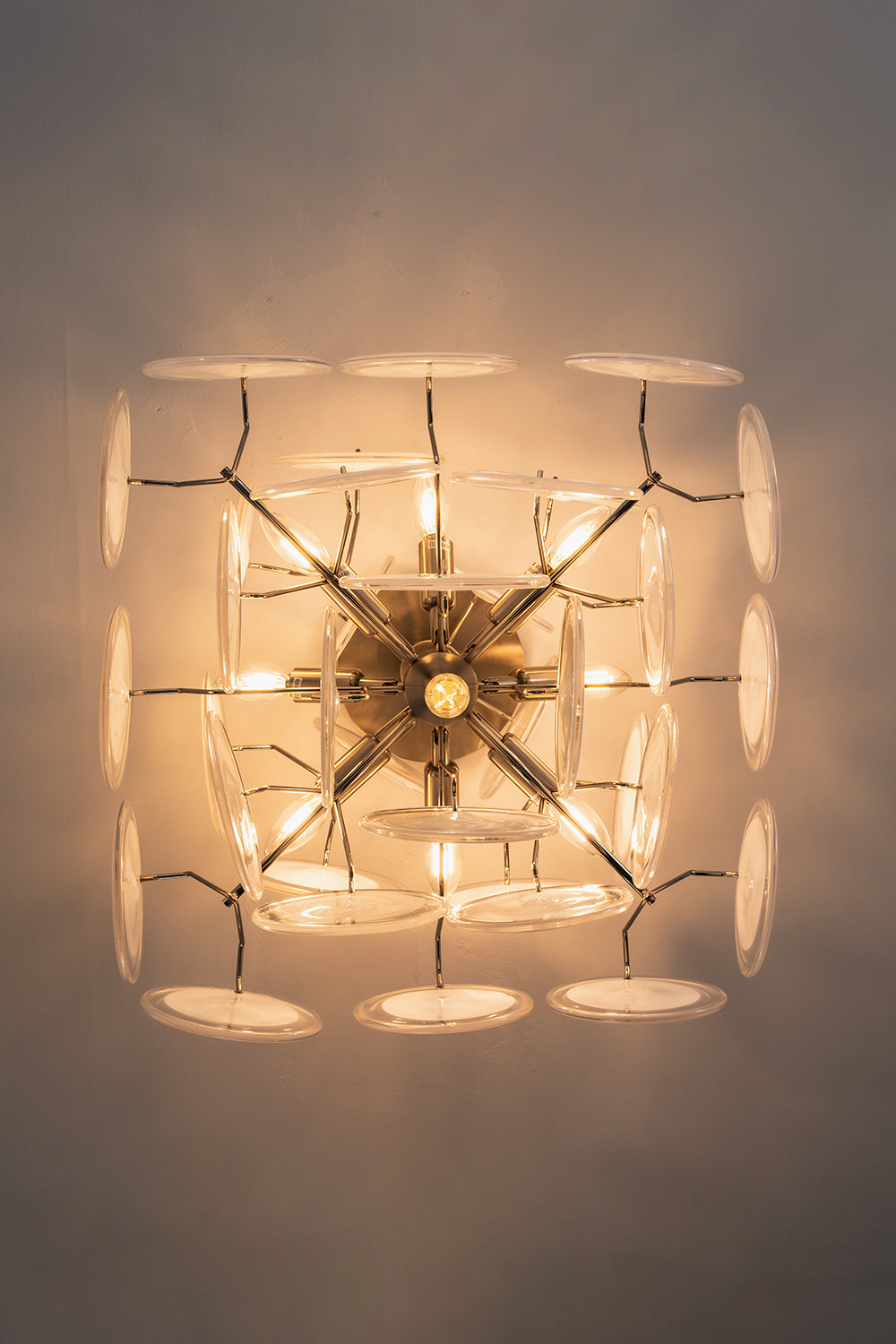 Mirella Circular Glass Pane Ceiling Light | Bottom-Up View | Direct bottom-up look at the fully illuminated ceiling lamp showcasing its radial symmetry and glowing multi-disc structure | Samu Lamp