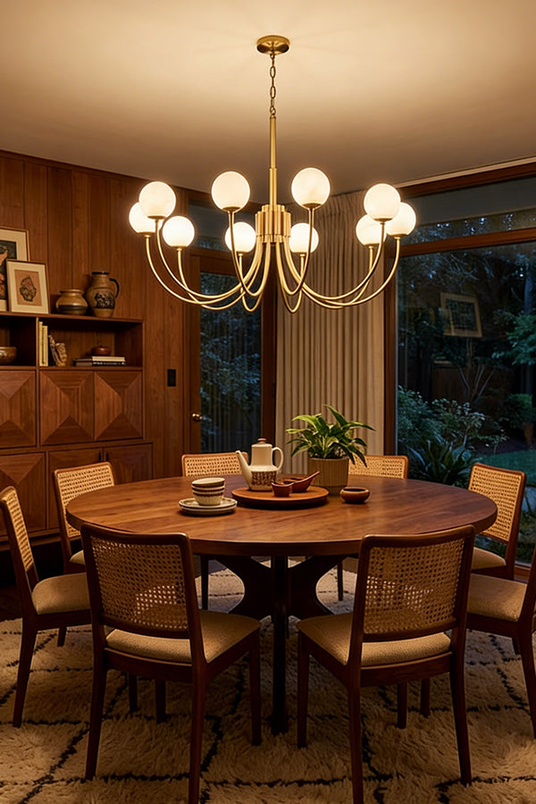 Elegant brass and alabaster globe light | Alabaster, Brass | Centered over a round wooden table with rattan chairs | Samu Lamp