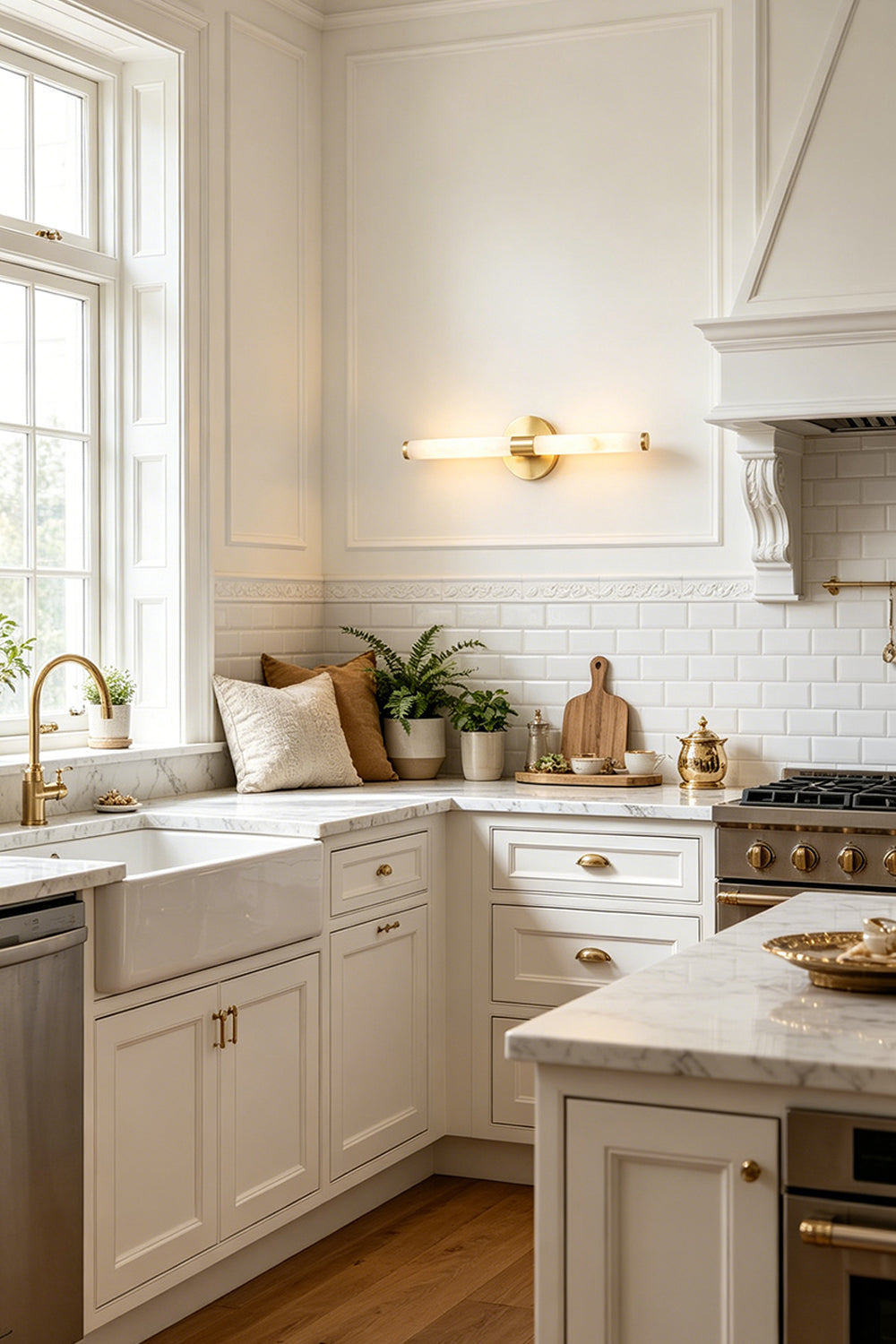 Nerida Linear Alabaster Wall Sconce | Alabaster, Brass | Installed horizontally as a luxury wall accent in a classical kitchen with white cabinetry and premium marble countertops | Samu Lamp