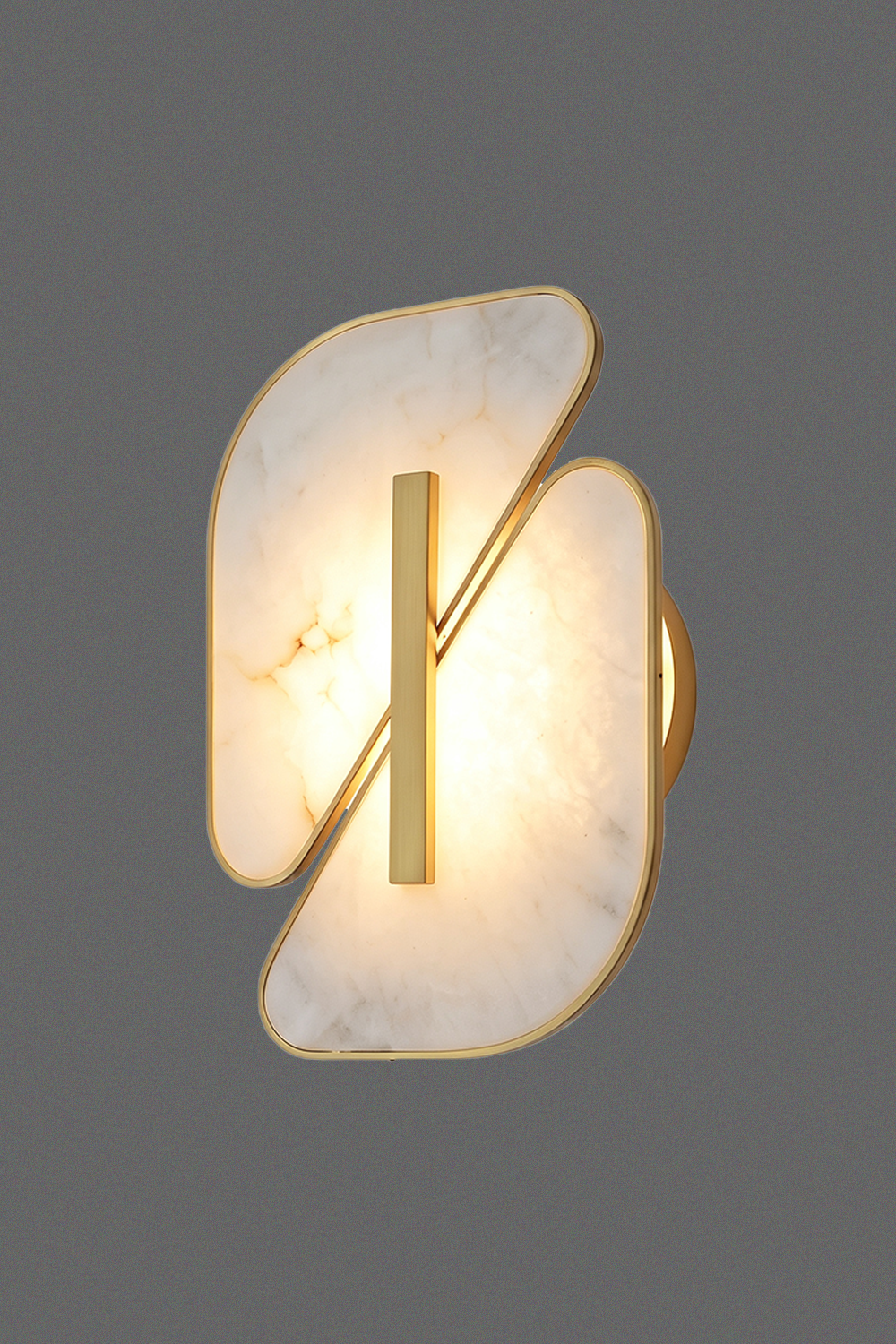 Nerine Overlapping Alabaster Wall Lamp featuring elegant overlapping alabaster design and warm glow.