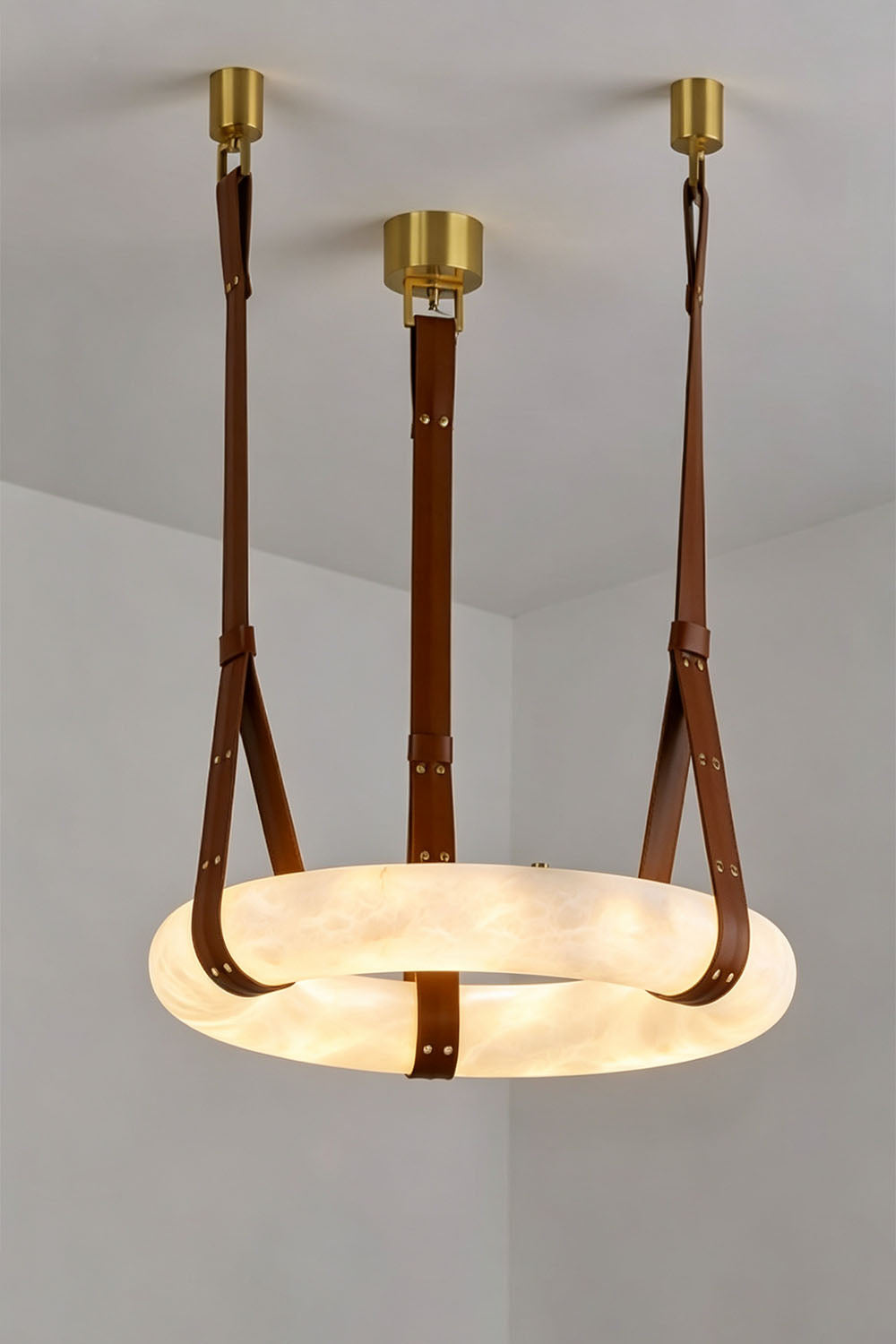 Nerissa Alabaster Ring Leather Pendant Light | Natural Alabaster, Leather and Brass | Full product view of 3-strap ring variant on a light grey backdrop | Samu Lamp