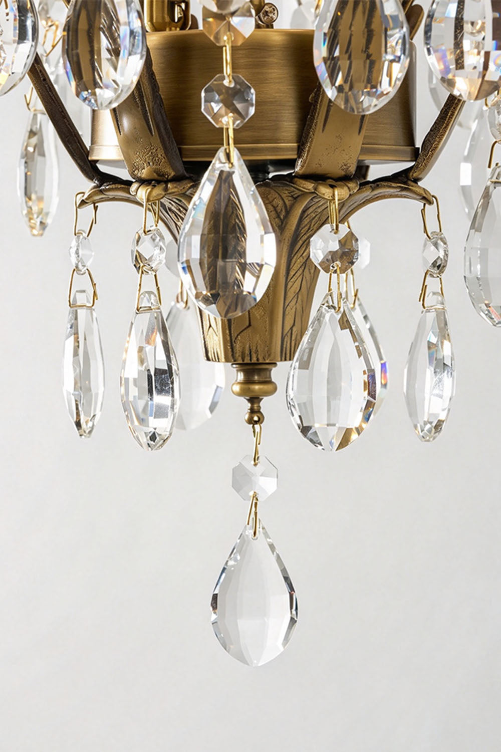 Ninon Crystal Basket Brass Pendant Light with elegant clear crystals and brass detailing, showcasing a stunning lighting design.