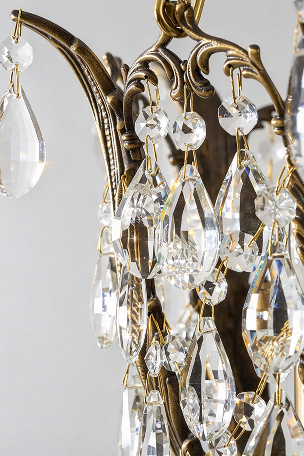 Close-up of the crystal detail on the Ninon Crystal Basket Brass Pendant Light showcasing sparkling teardrop crystals.