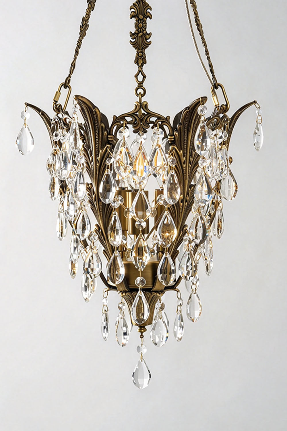 Ninon Crystal Basket Brass Pendant Light featuring elegant crystal drops and ornate brass details.