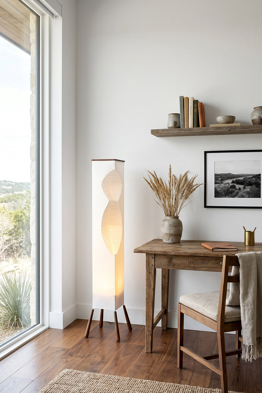 Nori Sculptural Leaf Floor Lamp | Fabric, Wood | Providing soft ambient light in a modern home office next to a wooden writing desk and chair | Samu Lamp