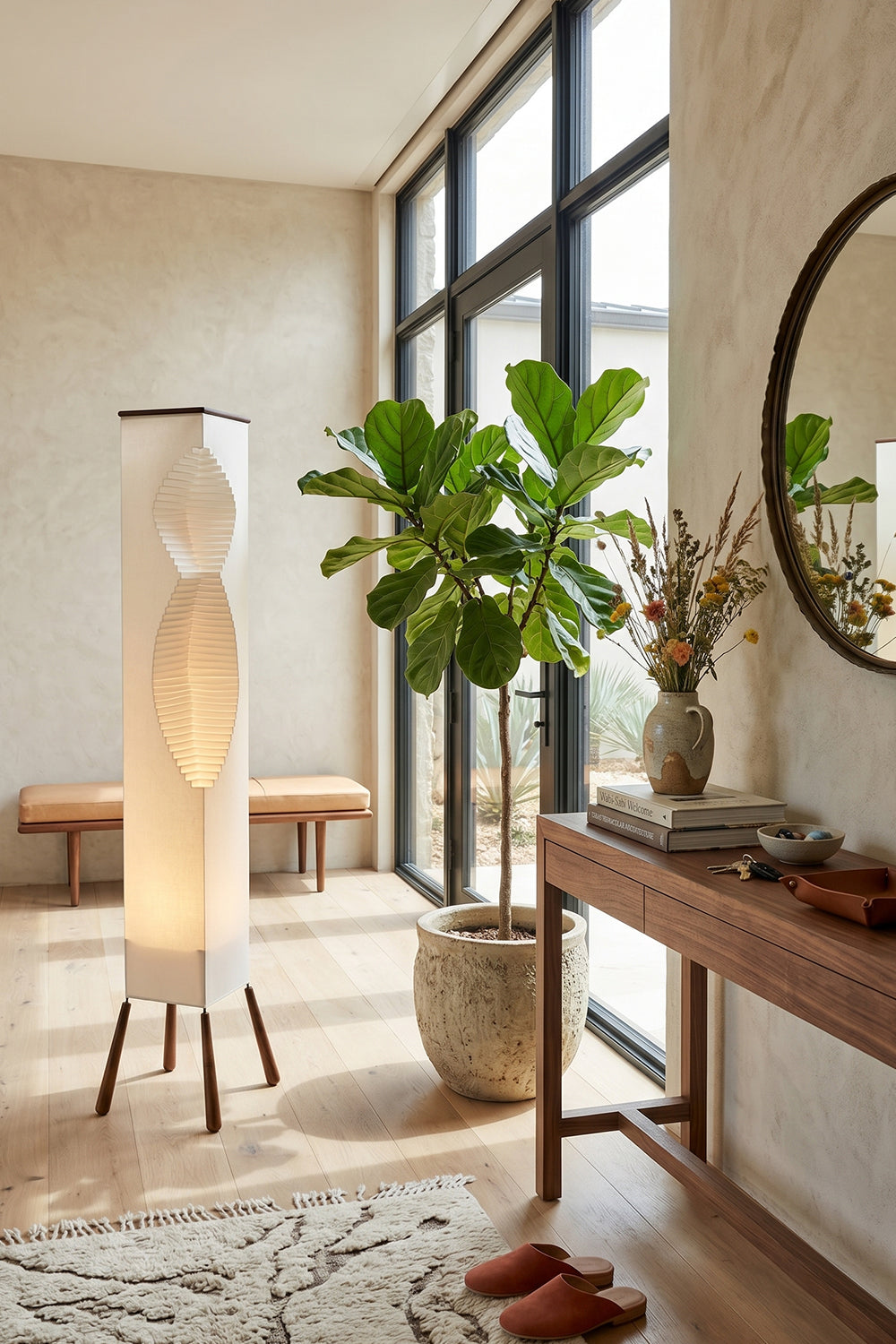 Nori Sculptural Leaf Floor Lamp | Fabric, Wood | Close-up corner shot highlighting the warm golden glow of the layered leaf-like structure near window blinds | Samu Lamp