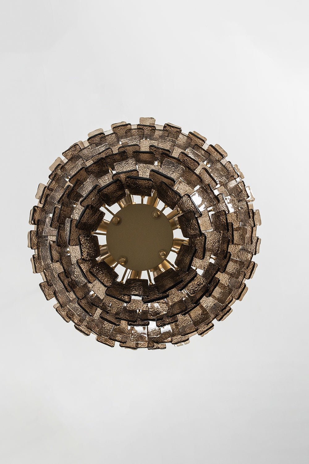 Octavia Sculptural Smoked Glass Chandelier | Ceiling Perspective | Alternative bottom-up studio view of the circular sculptural glass chandelier against a clean white backdrop | Samu Lamp