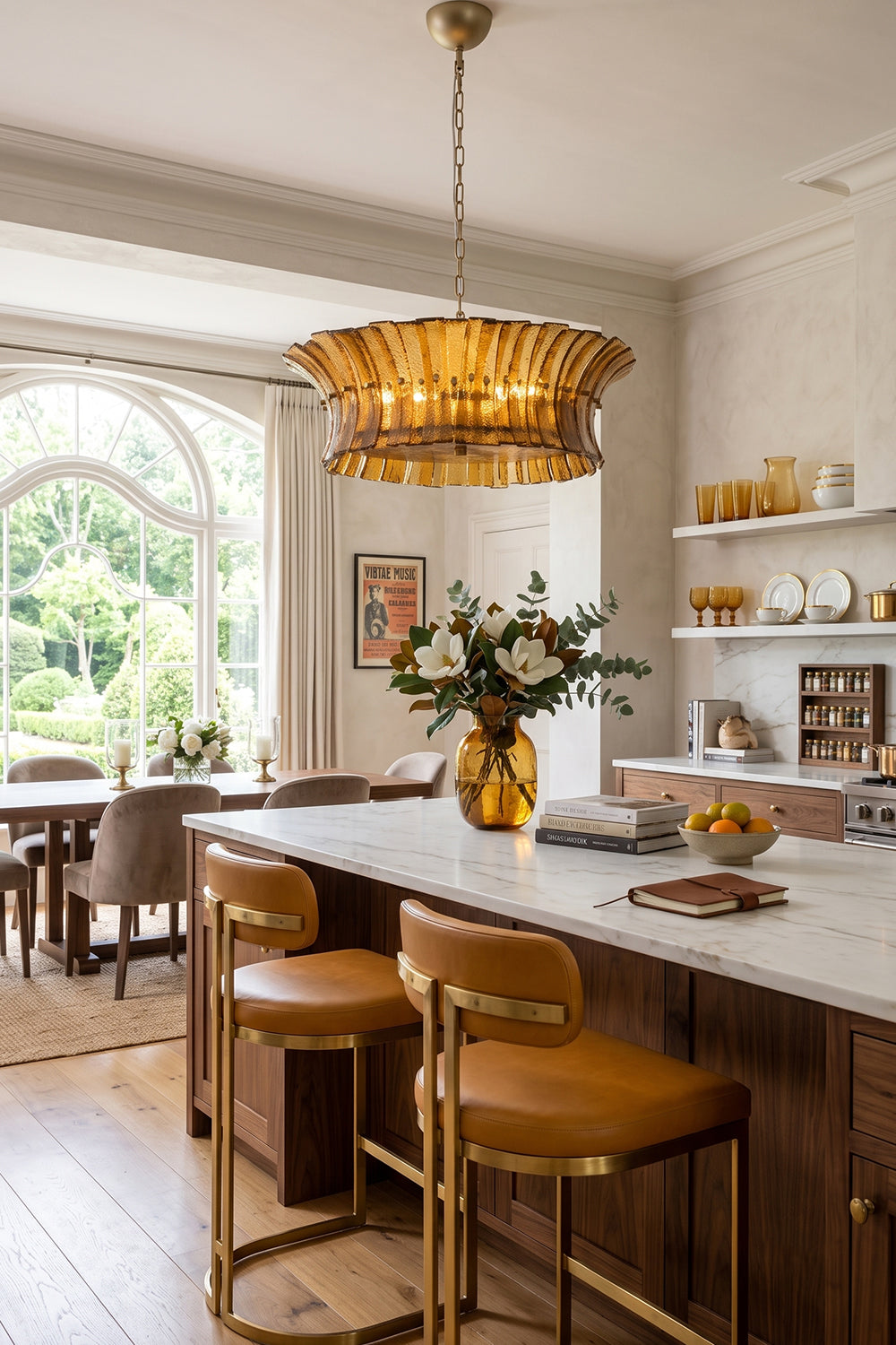Octavia Sculptural Smoked Glass Chandelier | Kitchen Island Lighting | Hanging as a luxurious centerpiece over a rich wooden island counter with leather barstools in a bright contemporary kitchen | Samu Lamp