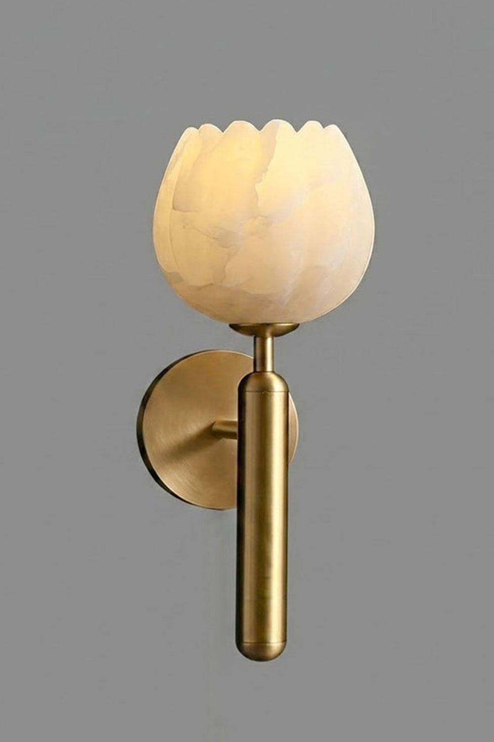 Ondine Alabaster Blossom Wall Sconce | Natural Alabaster and Brass | Standard portrait single product view hanging fully lit on a light neutral grey studio backdrop | Samu Lamp