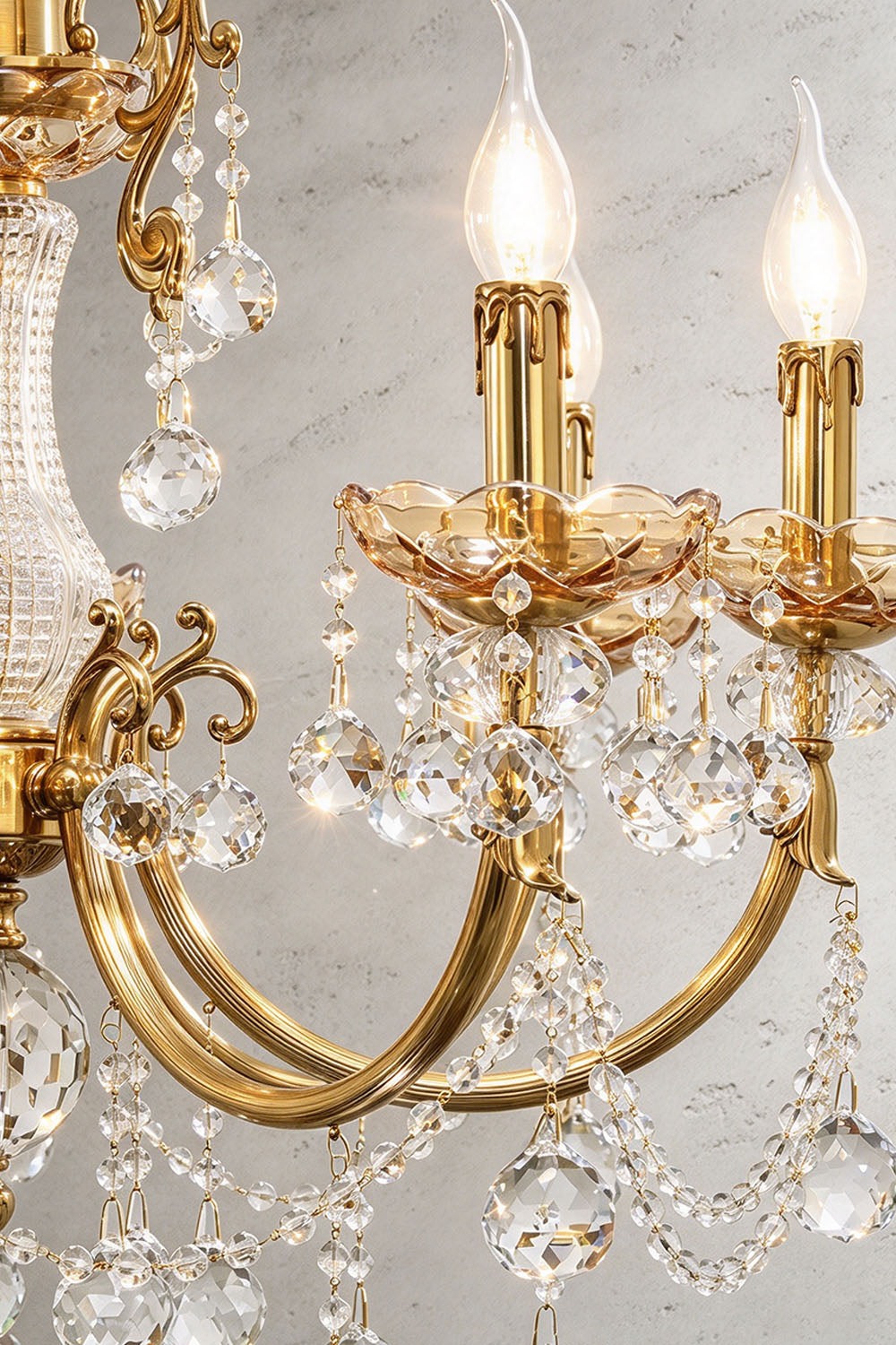 Orbessan Brass Crystal Oval Candle Chandelier | Cut Crystal and Brass | Close-up detail showing brass candle bulb sockets and crystal prisms | Samu Lamp