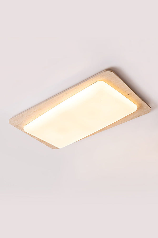 Angled product shot of travertine ceiling light | Yellow Travertine, Acrylic | Lit view isolated on white background | Samu Lamp