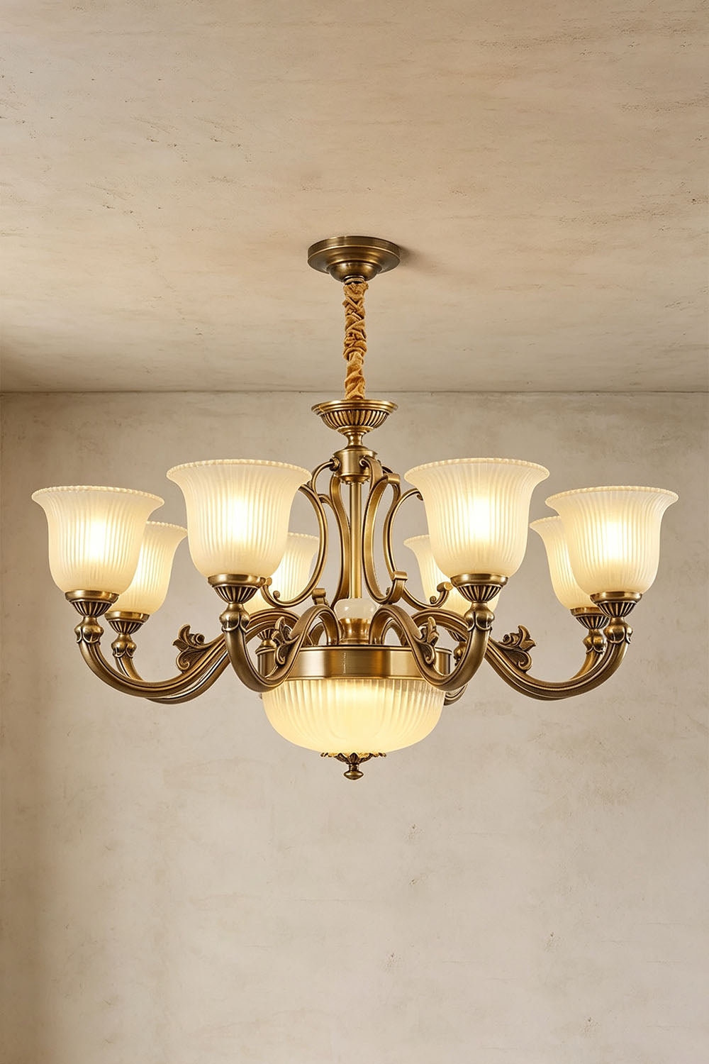 Ormond Fluted Bell Brass Chandelier featuring elegant glass shades and a vintage brass finish, ideal for home decor.