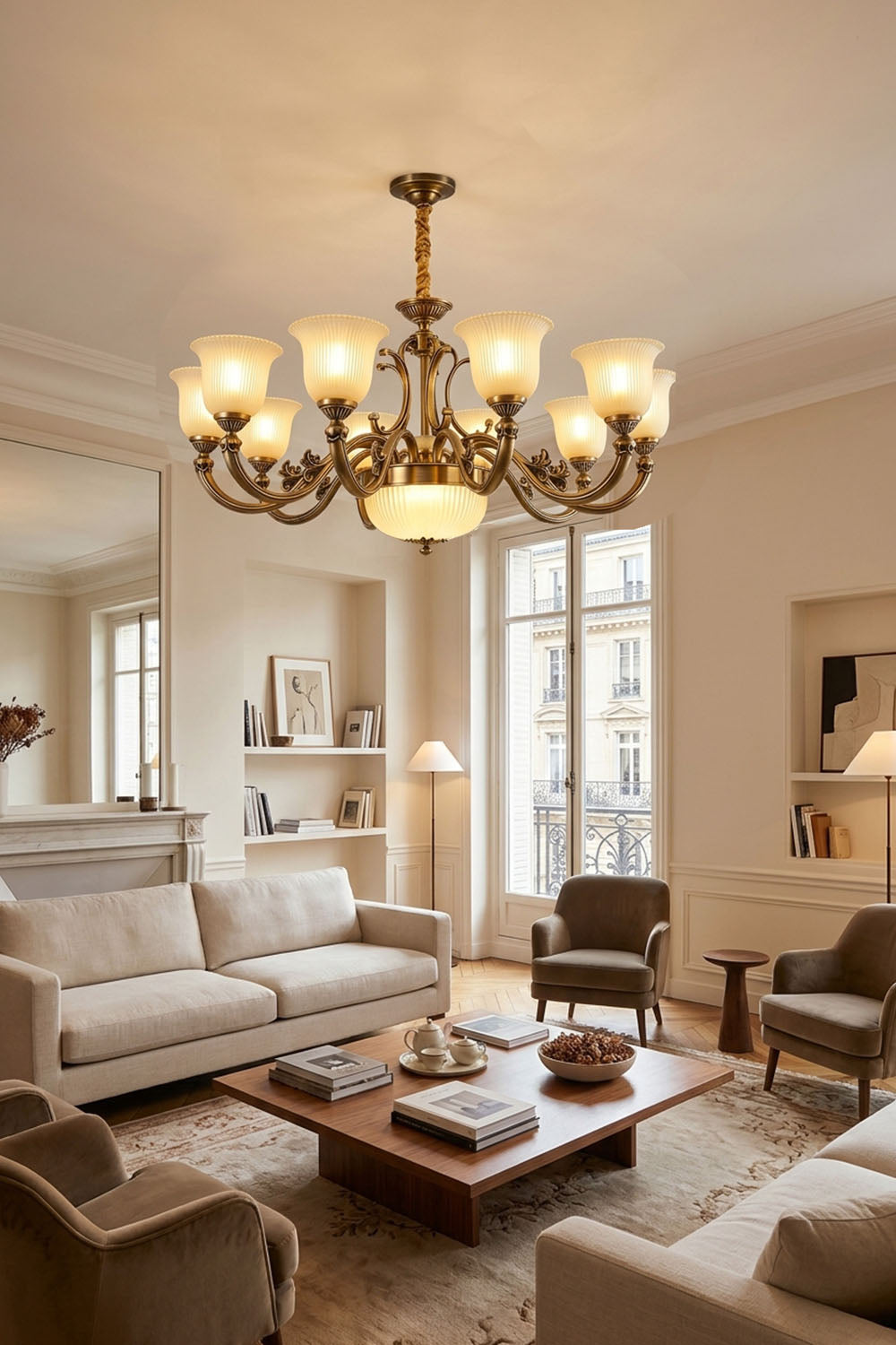 Ormond Fluted Bell Brass Chandelier illuminating a stylish living room with elegant furniture and natural light.