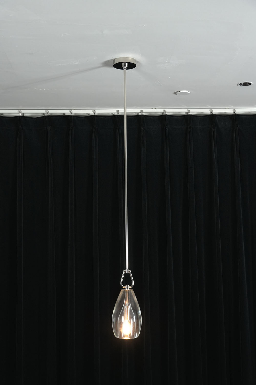 Faucenne Pierced Shade Crystal Spear Wall Lamp | Cut Crystal and Brass | Close-up view of the long hanging clear crystal rods | Samu Lamp