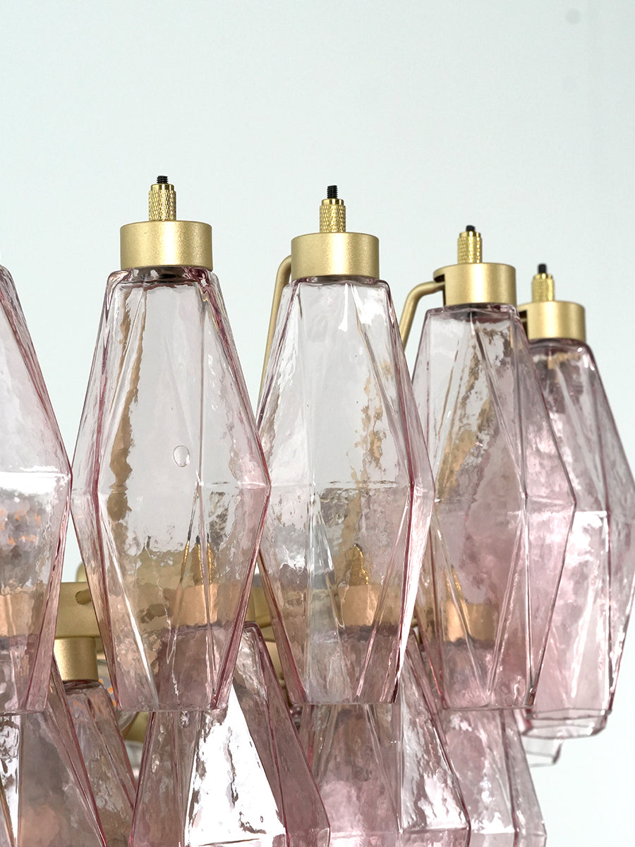 Close-up of pink glass prisms and brass caps | Metal, Glass | Detail shot showing the hardware connections | Samu Lamp
