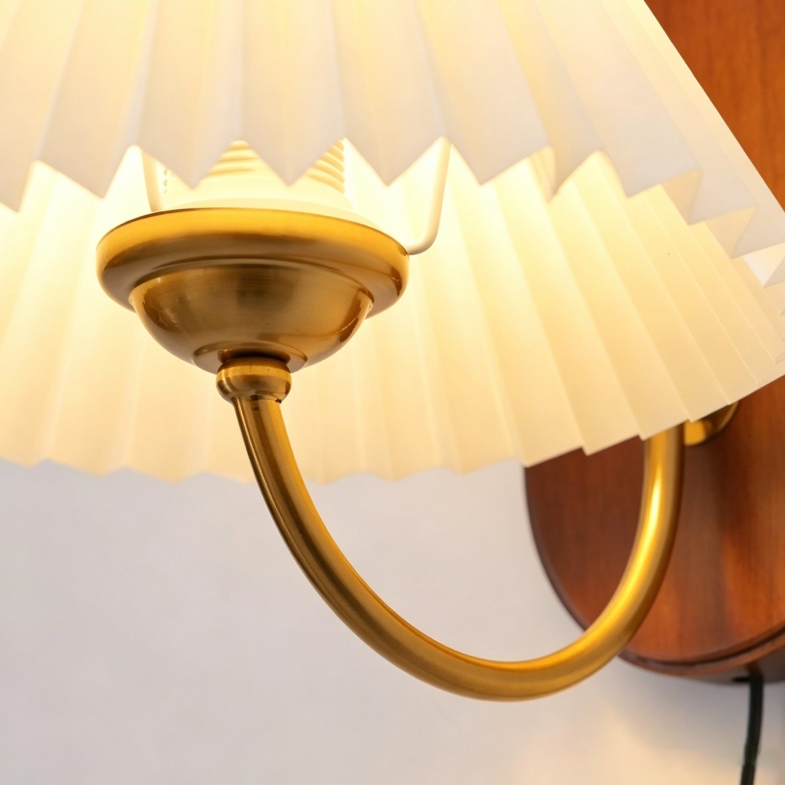 Curved Gold-Toned Arm