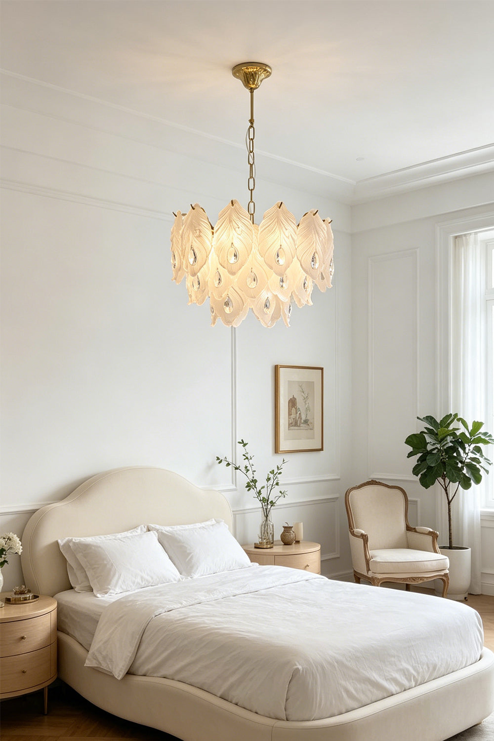 Pluma Frosted Glass Feather Chandelier | Glass, Metal | Installed as a serene bedroom overhead fixture casting a warm ambient glow over a cream bed and accent chair | Samu Lamp