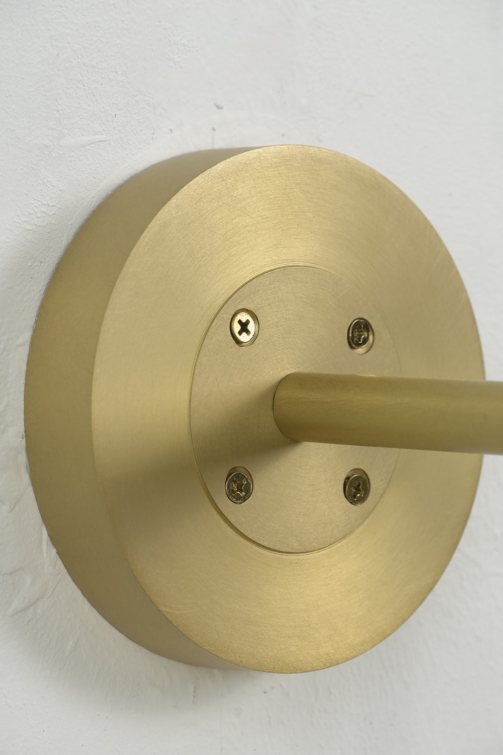 Brass mounting backplate for Portree wall light | Brass | Detailed view of the circular wall mount | Samu Lamp