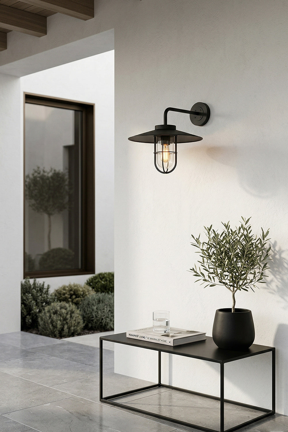 Black industrial style outdoor wall lamp | Metal, Glass | Installed near a house entrance and patio area | Samu Lamp