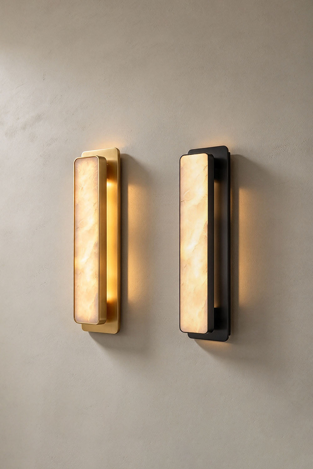 Quadrelle Wall Sconce | Alabaster and Metal | Side-by-side comparison of brass and bronze finishes lit | Samu Lamp