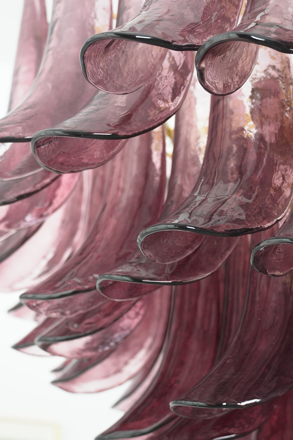 Regal Purple Cascade Chandelier | Glass, Metal | Detailed side view of the layered purple glass elements against a white background | Detail shot | Samu Lamp