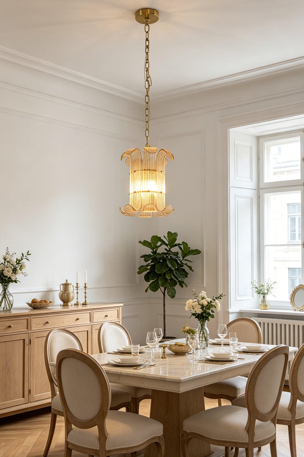 Elegant scroll ribbed glass chandelier | Metal | Glass | Installed in a sophisticated dining room interior | Samu Lamp
