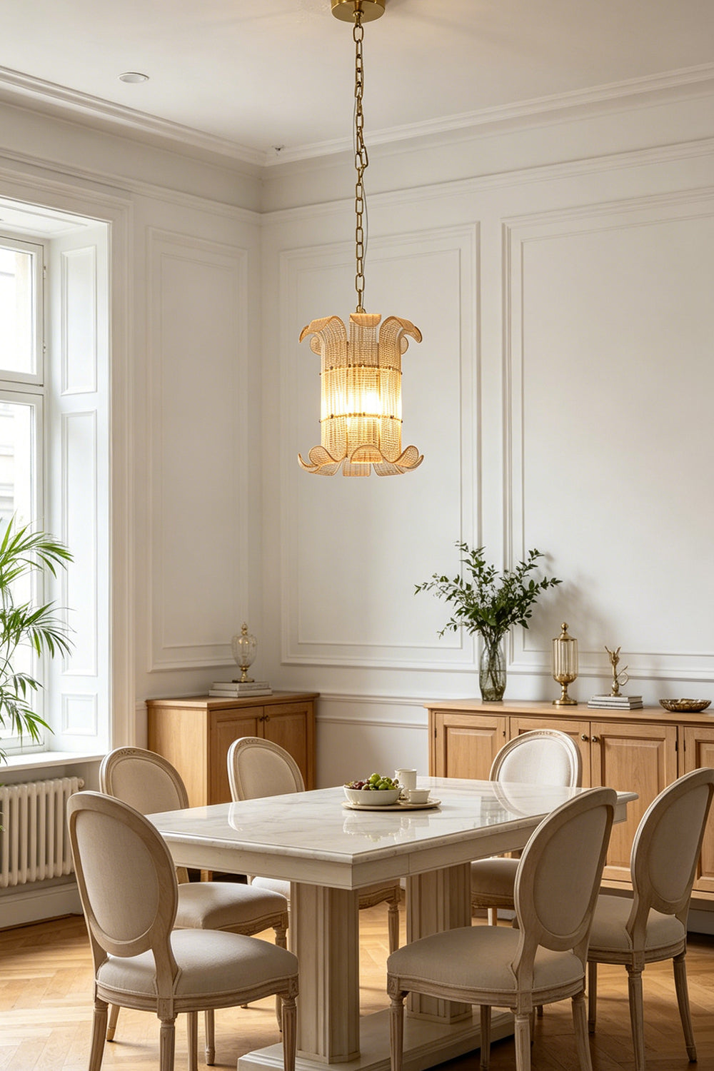 Modern classic ribbed glass chandelier | Metal | Glass | Installed over a dining table near a wooden sideboard | Samu Lamp