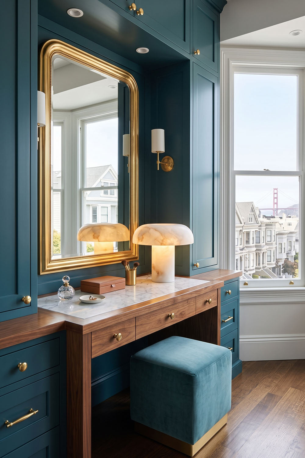 Rosalind Alabaster Dome Table Lamp | Natural Alabaster and Brass | Installed on a blue vanity dressing table with a mirror | Samu Lamp