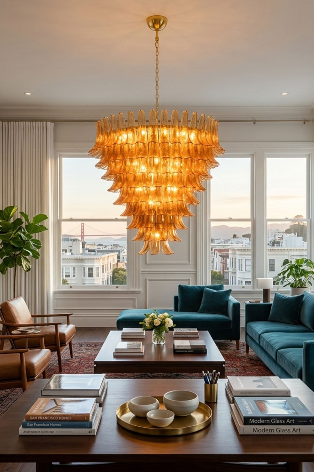 Rouveline Rippled Amber Glass Cone Chandelier | Rippled Amber Glass and Metal | Displayed in a luxury living room with blue sofas and bay windows | Samu Lamp