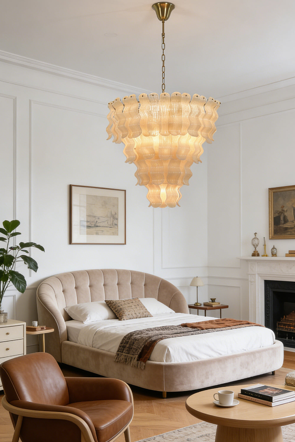 Grand ruffled tiered chandelier | Metal | Glass | Installed in a luxury bedroom above a tufted headboard | Samu Lamp