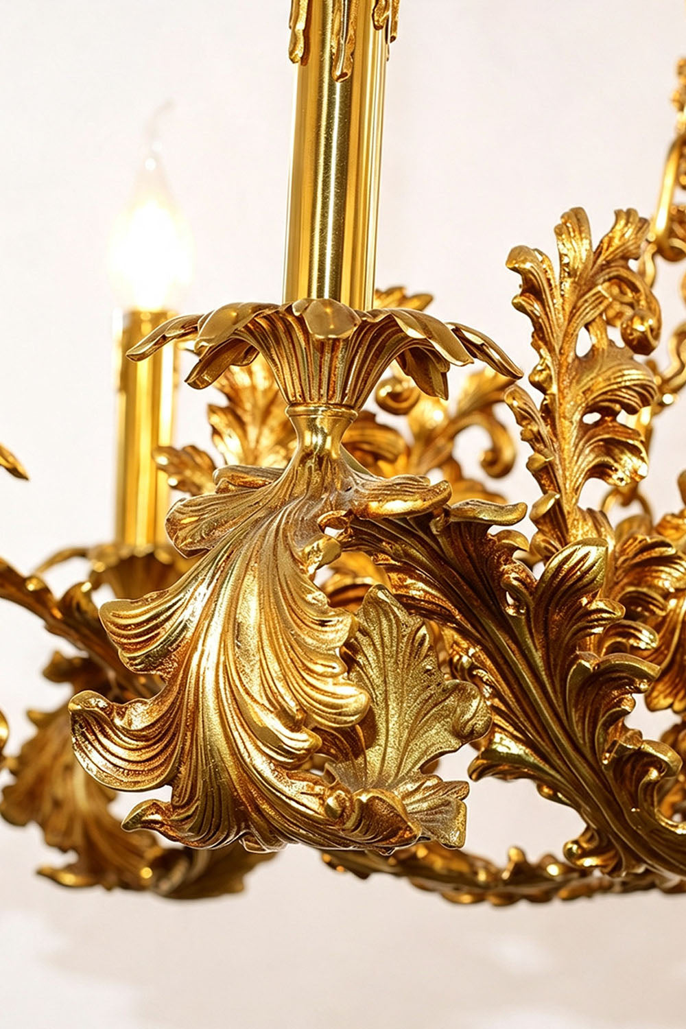Rurik Acanthus Leaf Brass Chandelier showcasing intricate golden leaf detailing and elegant craftsmanship.