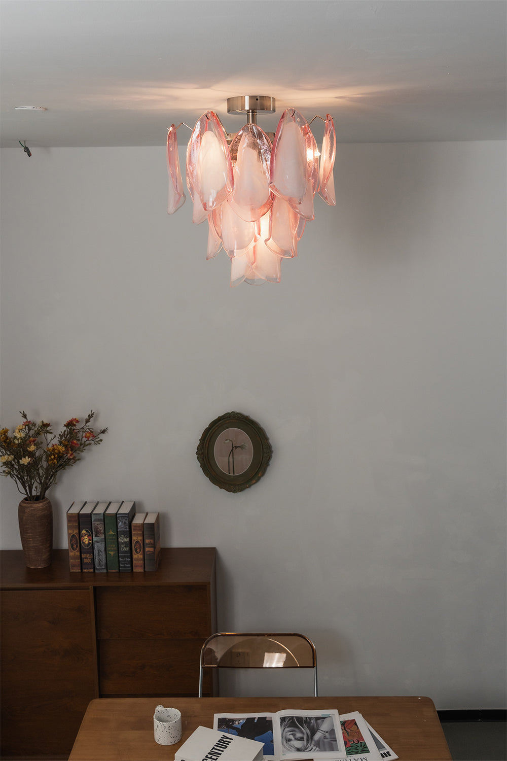Lit Seraph petal glass ceiling lamp with warm glow | Metal, Glass | Studio setting showing the soft light diffusion | Samu Lamp