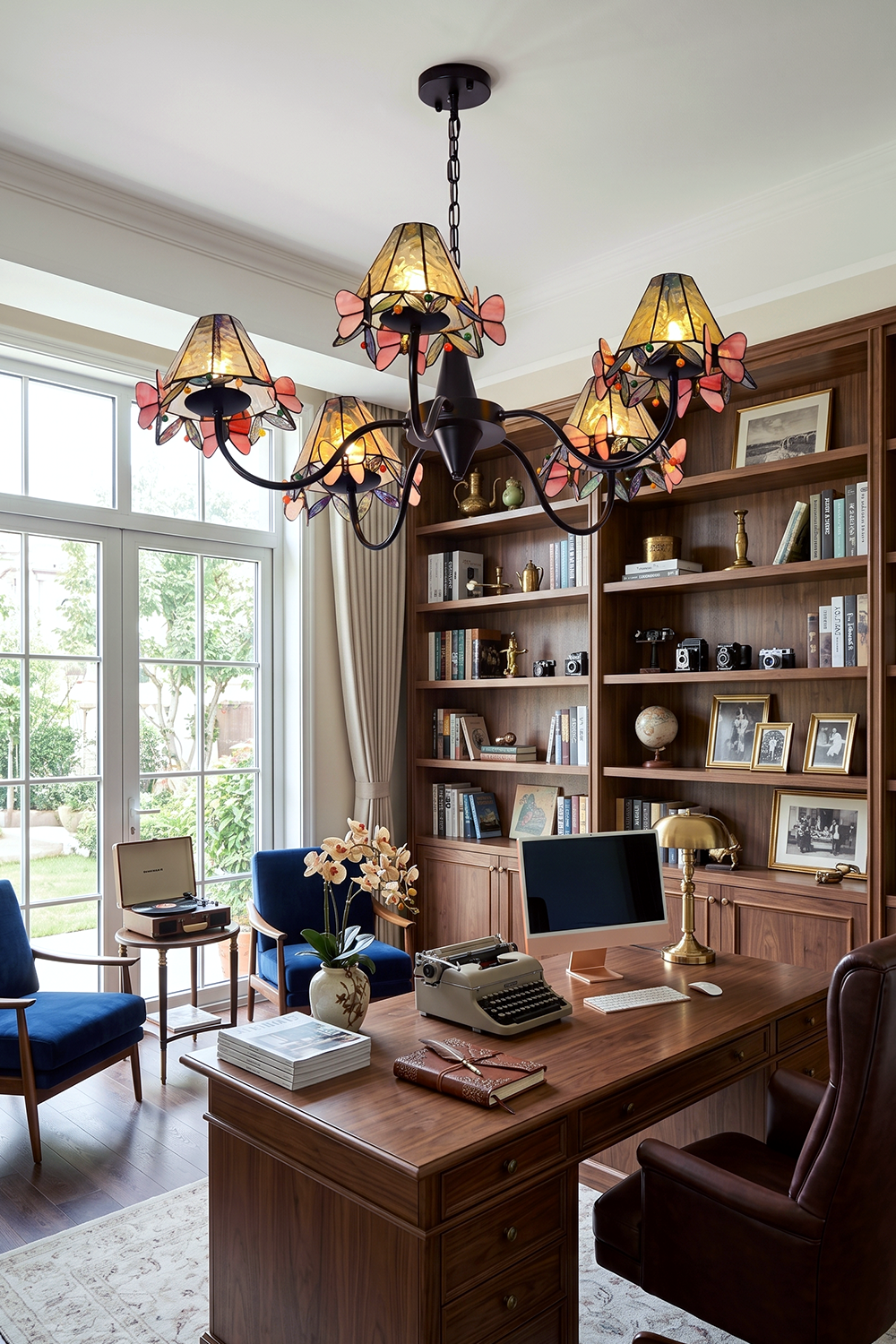 Seraphina Stained Glass Chandelier | Glass, Metal | Providing a warm ambient glow in a traditional home library over a wooden writing desk and leather chair | Samu Lamp