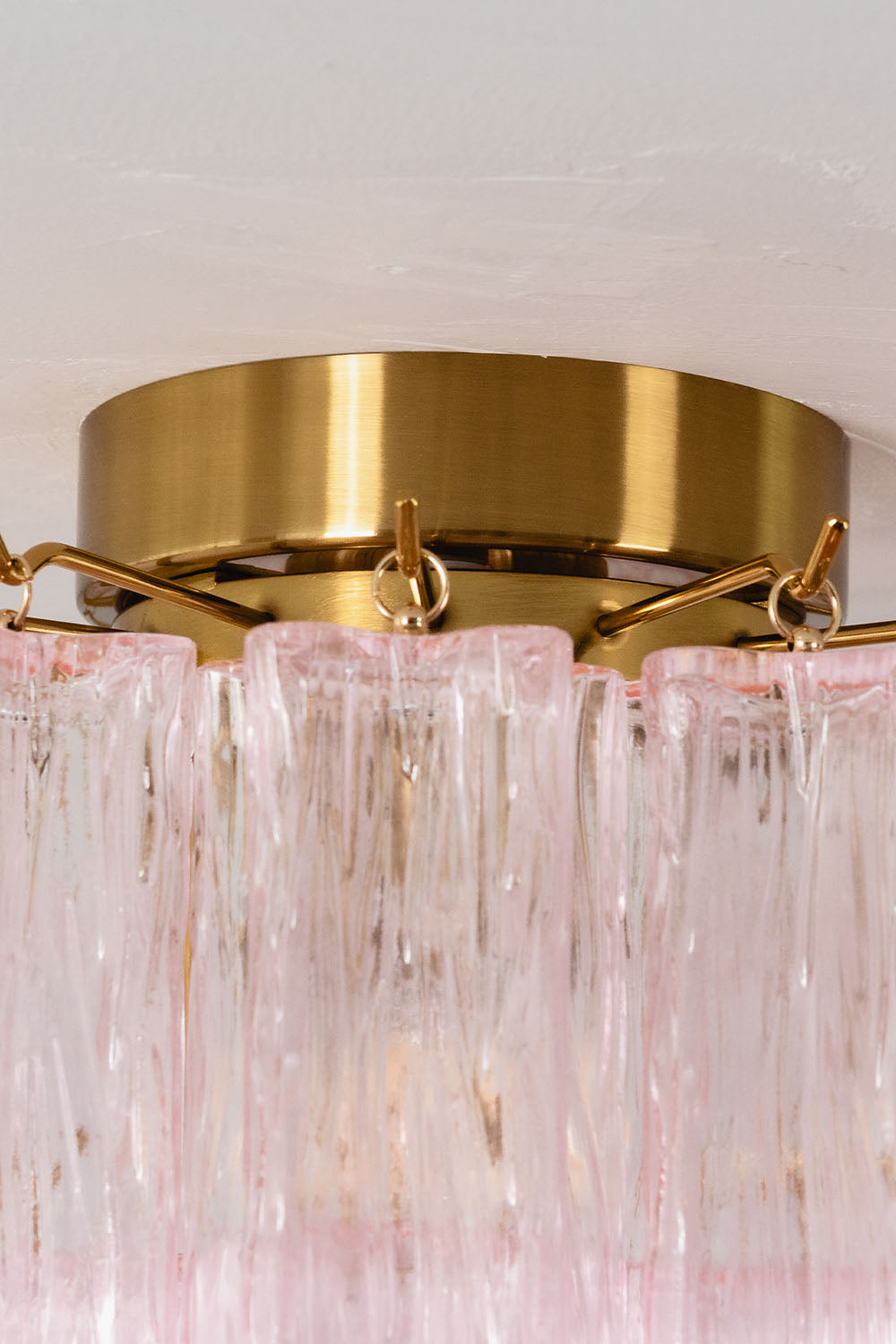 Seraphine Starburst Glass Tube Ceiling Light | Pink Glass and Brass | Close-up view of the brushed brass flush mount top canopy | Samu Lamp