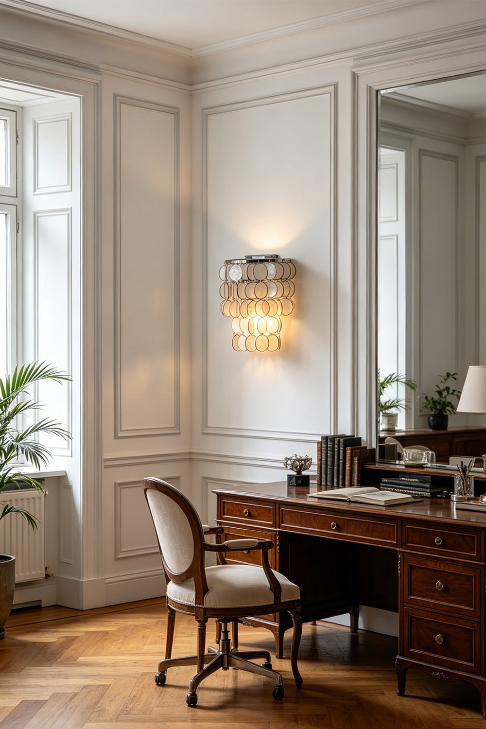 Round Capiz shell wall sconce | Shell | Iron | Home office scene with desk and natural light | Samu Lamp