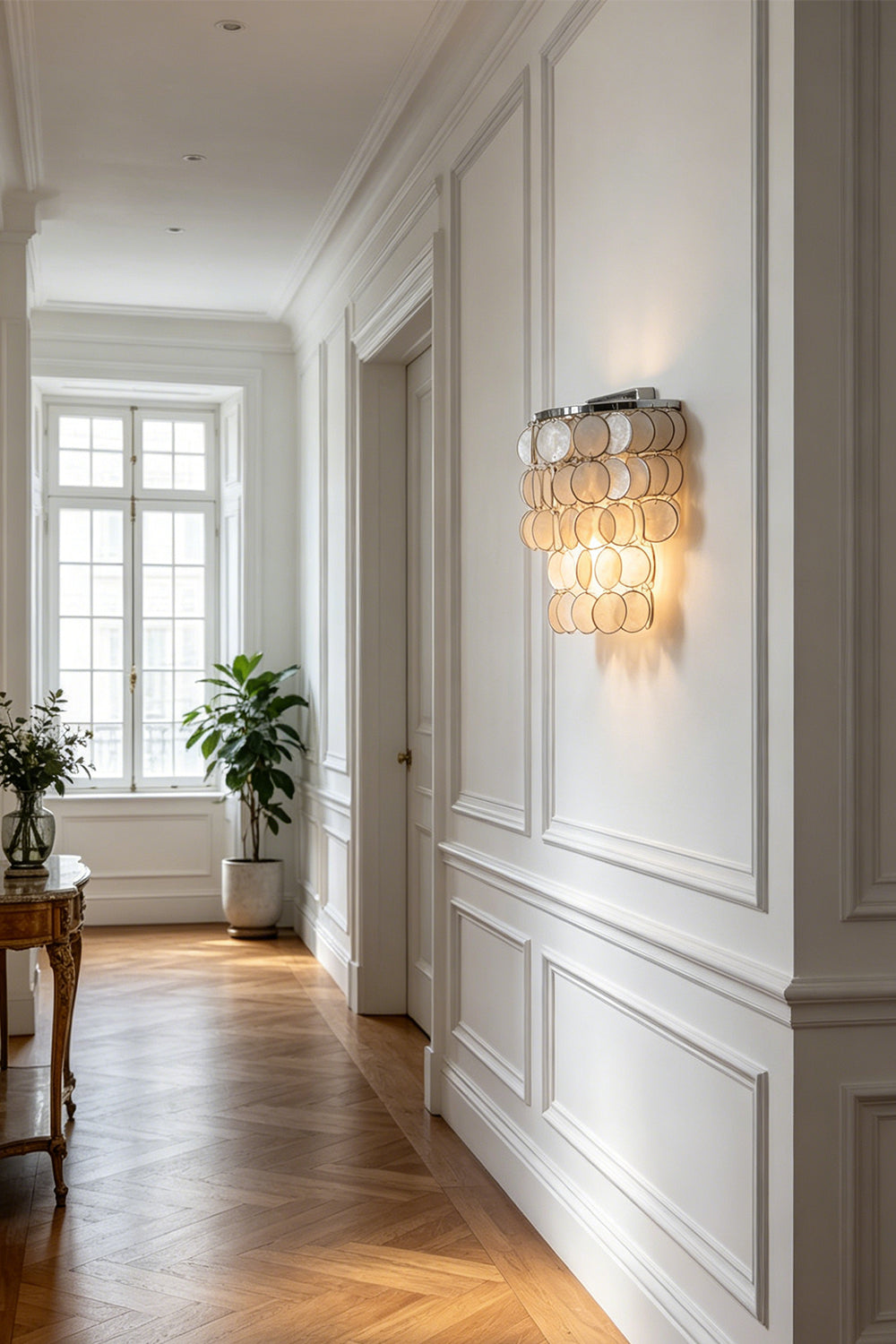 Capiz shell wall light in hallway | Shell | Iron | View showing a bright corridor with wall molding | Samu Lamp
