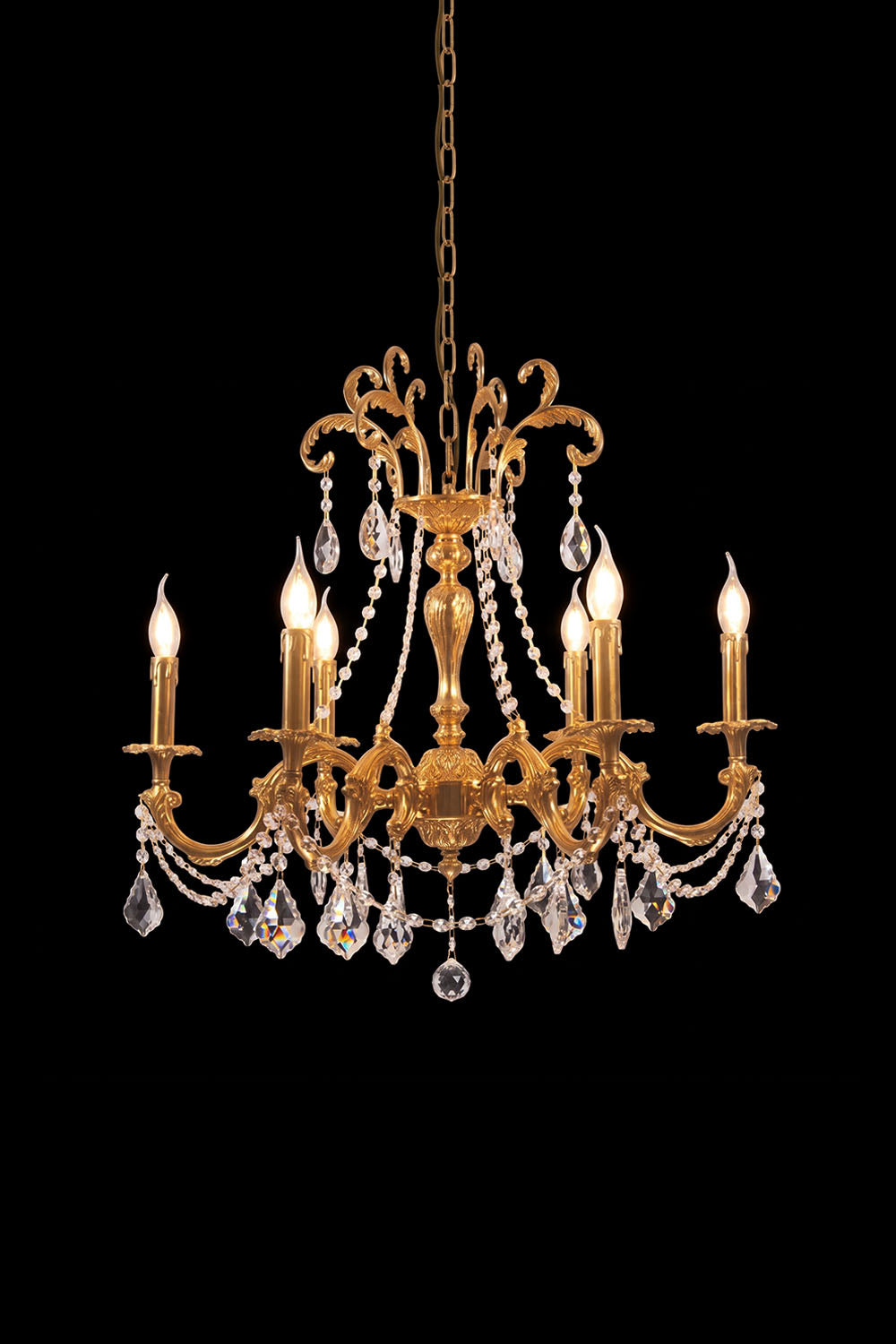 Sidonie Scrolled Brass Crystal Chandelier featuring elegant gold design and sparkling crystals.