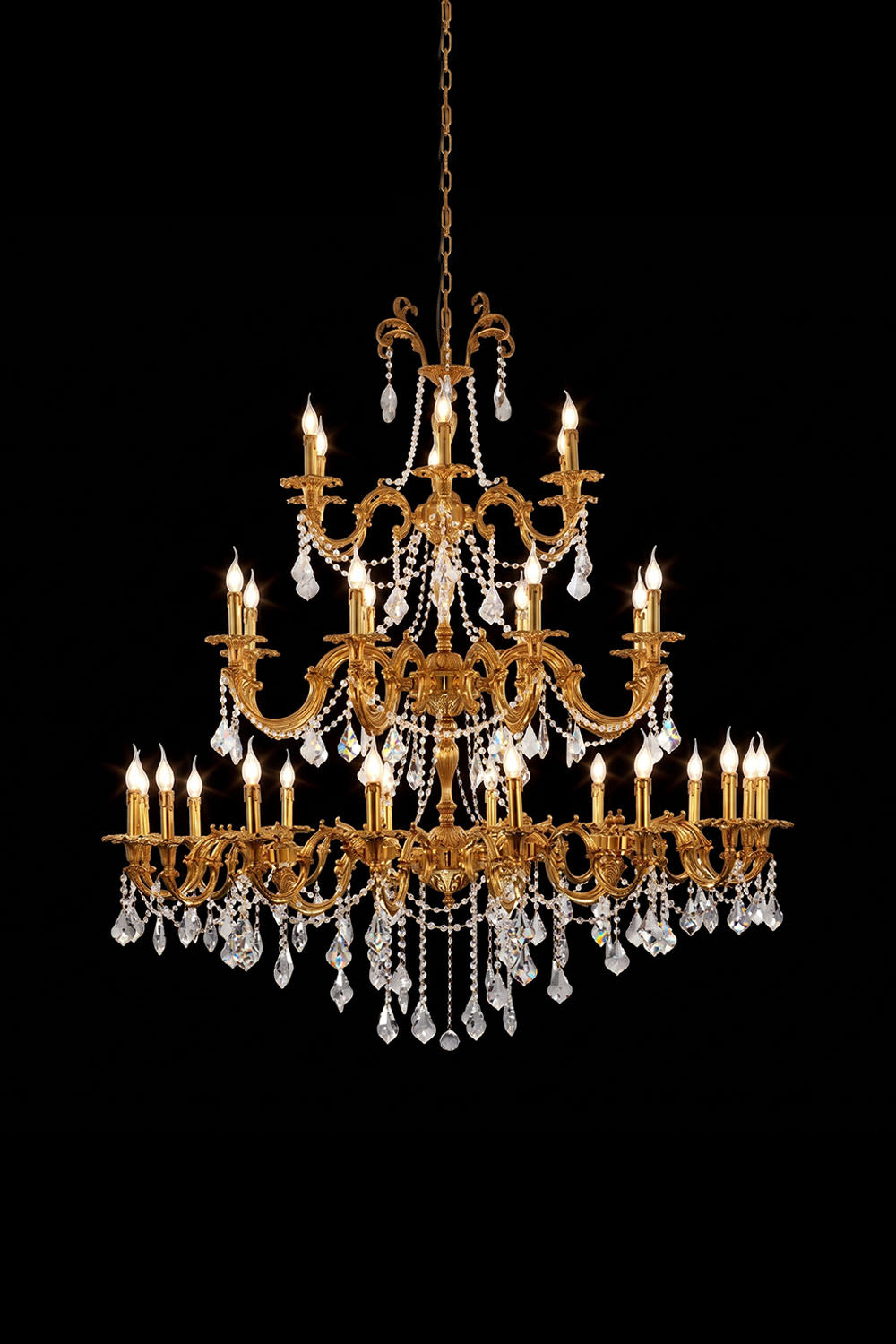 Sidonie Scrolled Brass Crystal Chandelier featuring elegant brass design and dazzling crystal accents.