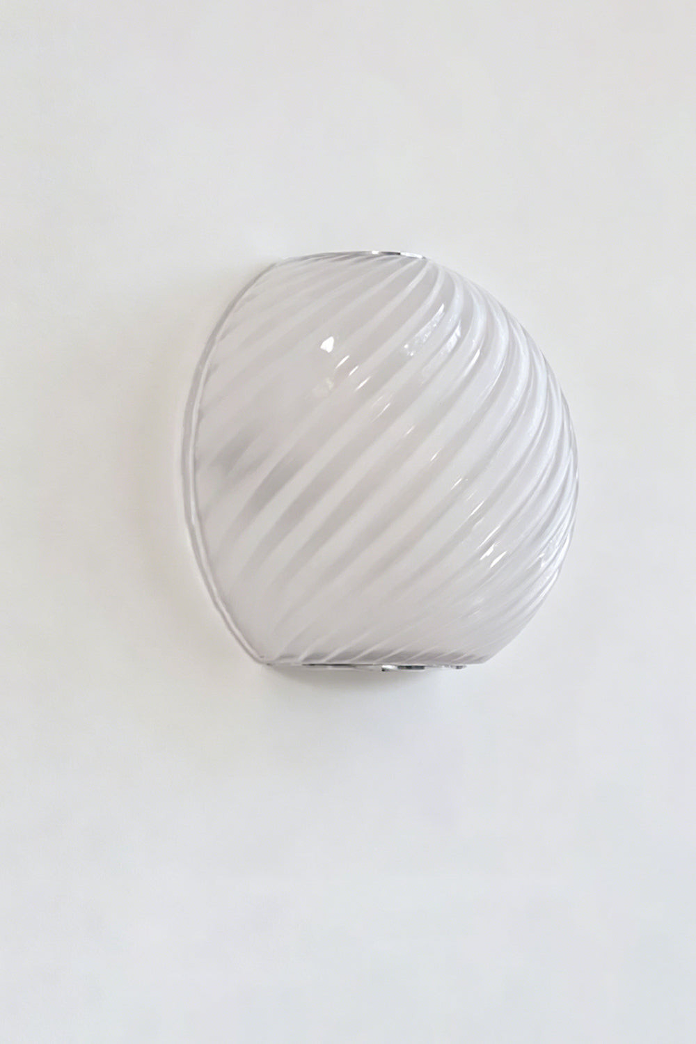 Silas Ribbed Glass Wall Sconce | Ribbed Glass, Metal | Studio unlit view of the white frosted opal ribbed glass finish option displaying its smooth textured surface | Samu Lamp