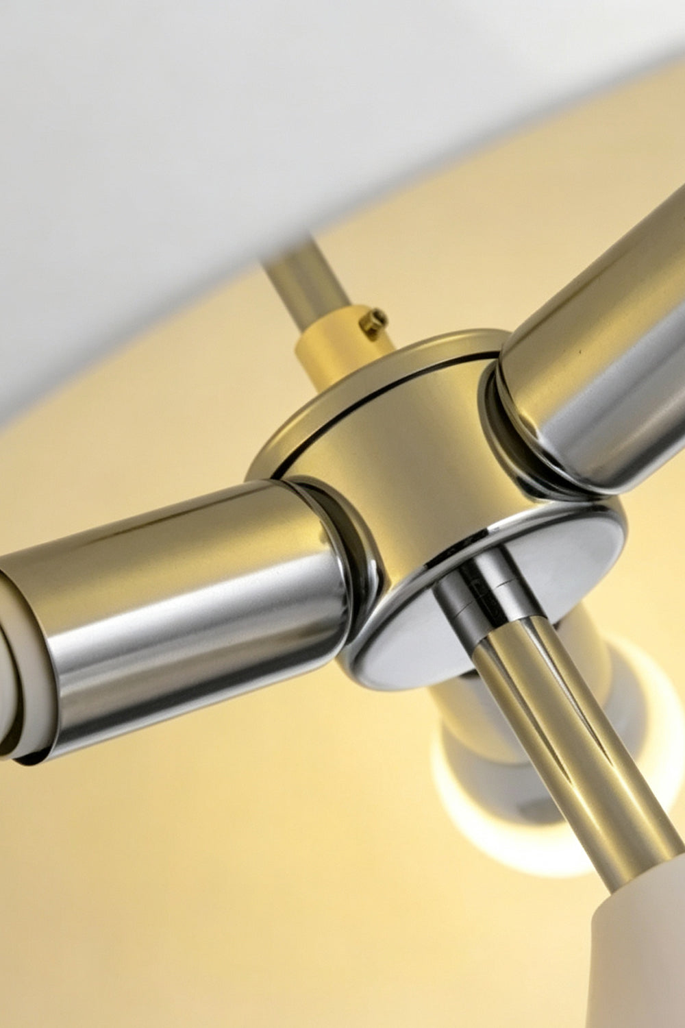 Solene Domed Glass Table Lamp | White Frosted Glass | Macro close-up shot focusing on the internal polished gold and chrome metal hardware structure | Samu Lamp
