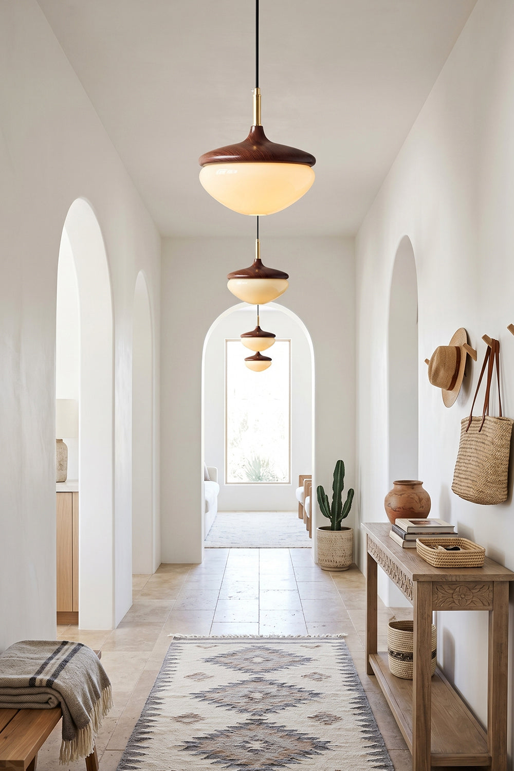Soren Wood Grain Pendant Lamp | Wood, Glass, Metal | Multi-light installation lining a long, bright minimalist arched hallway with bohemian decor | Samu Lamp