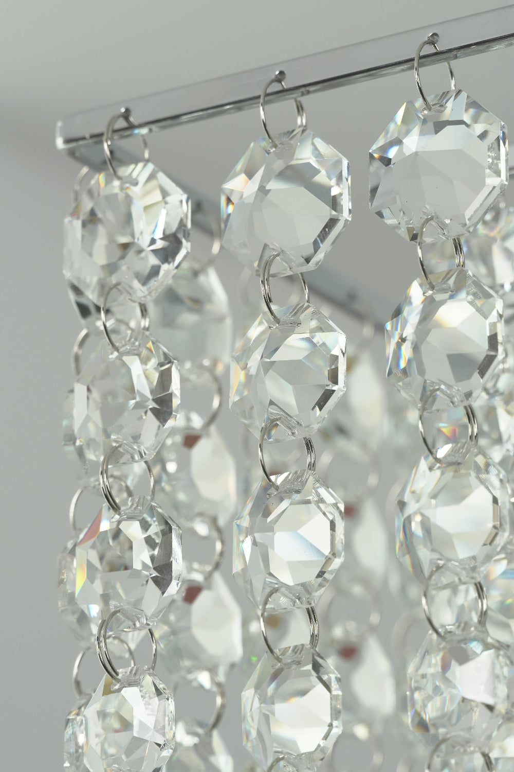 Vertical strands of sparkling crystal beads | Crystal | Close-up showing the clarity and arrangement of crystals | Samu Lamp