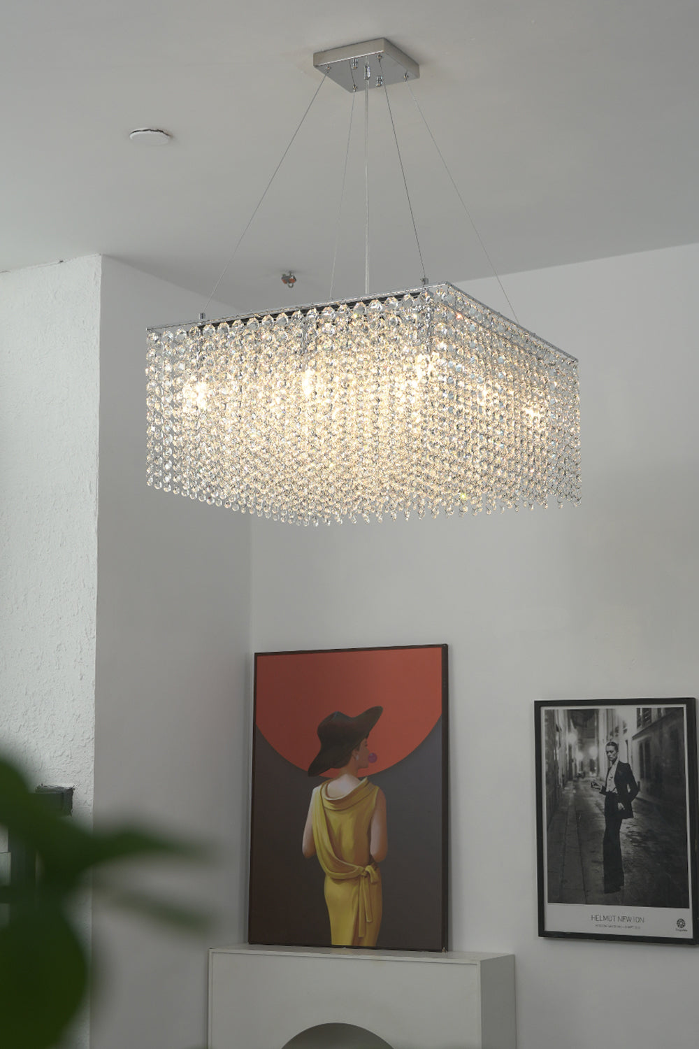 Rectangular crystal pendant light providing bright illumination | Stainless Steel, Crystal | Mounted in a room with modern paintings | Samu Lamp