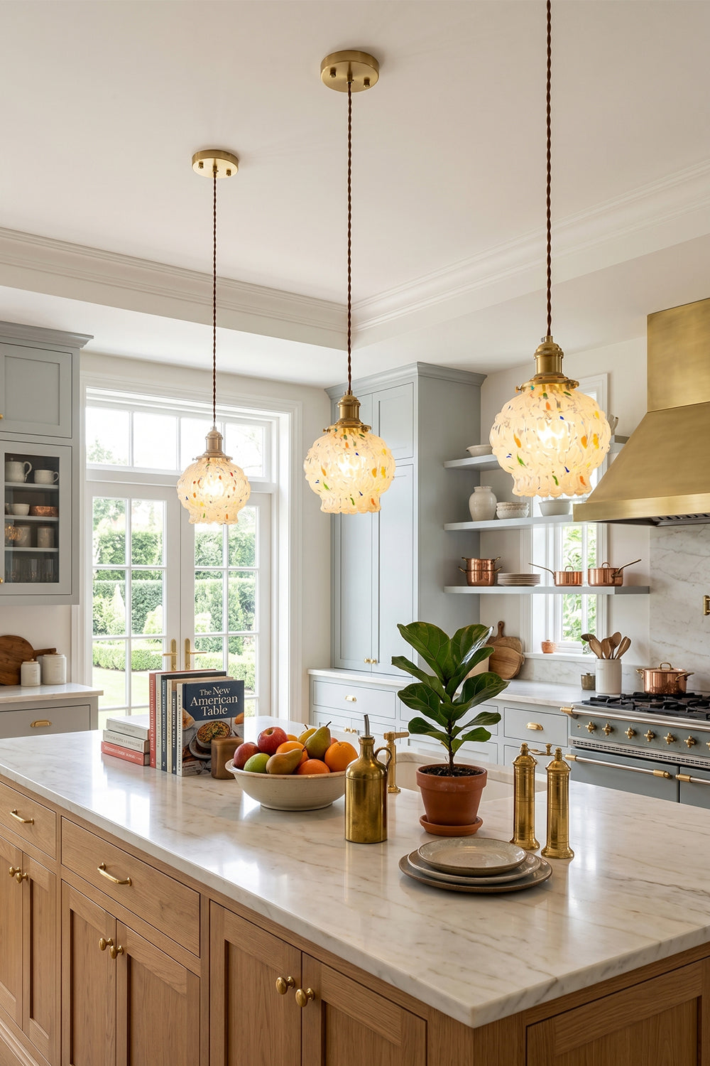 Speckled Bubble Glass Pendant Lamp | Glass, Metal | A trio of speckled glass pendants lined up over a modern light wood kitchen island in a bright home kitchen | Samu Lamp