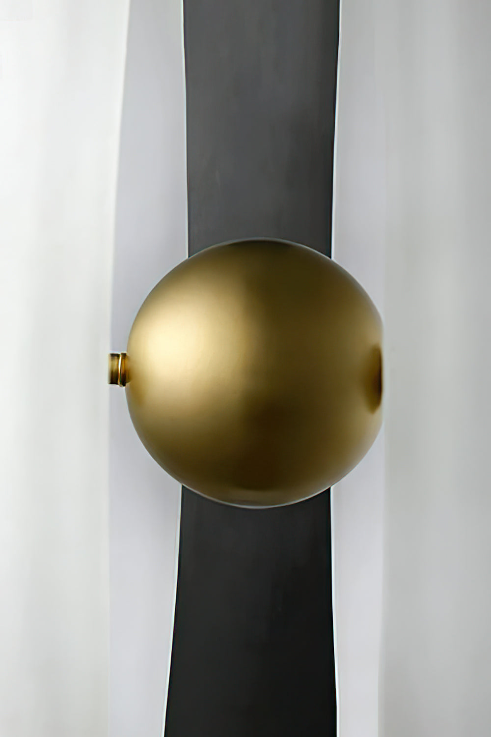 Macro view of the central brass ball and split glass | Metal, Glass | Showing the polished hardware and shadow gap | Samu Lamp