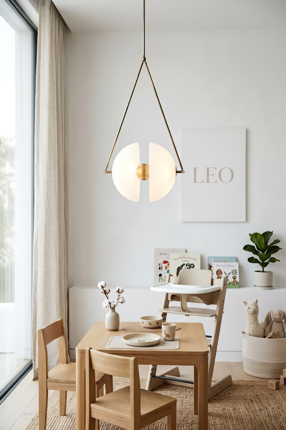 Oyster glass pendant light for nursery | Metal, Glass | Installed over a small wooden table and chairs | Samu Lamp